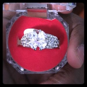 Diamond heart shape ring.
